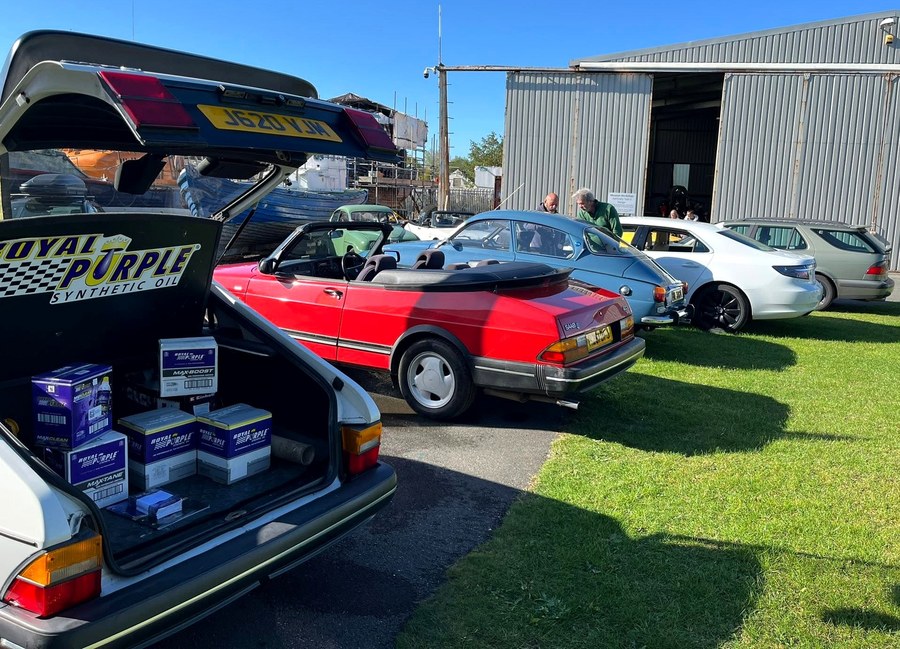 Cars and displays outside the museum buildings.